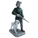 Bing & Grøndahl; Figurine of porcelain, hunter with dog #2328