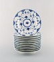 Royal Copenhagen porcelain dinnerware. Set of eleven Blue Fluted Full Lace 
plates no 1/1087.