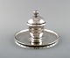 L'Art presents: Rare and early Georg Jensen ink well in sterling silver with glass insert. Dated 1915-1930.