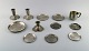 Just Andersen. Three candlesticks, eight bottle trays and a mug in pewter. 1930 
/ 40