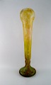 Daum Nancy, France. Colossal art deco floor vase in frosted mouth blown art 
glass carved with motifs in the form of flowers and leaves. 1920/30