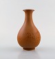 Gunnar Nylund for Rörstrand. Vase in glazed stoneware. Beautiful glaze in brown 
shades. 1960