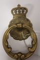 Door knocker
This antique door knocker is made of brass
About 1930
In a good condition