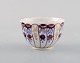 Royal Copenhagen. Antik og sjælden kop i håndmalet porcelæn. Museumskvalitet. 
Dateret 1820-1850.

