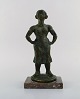 Eric Demuth, Swedish sculptor. Bronze sculpture on marble base. Woman with her 
hands on her thighs. 1940 / 50