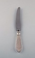 Georg Jensen "Continental" dinner knife in sterling silver and stainless steel. 
Dated 1915-30. Two pieces in stock.
