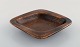 Gunnar Nylund for Rörstrand. Square dish in glazed stoneware. Beautiful glaze in 
brown shades. Rare form. 1960