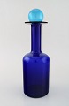 Otto Brauer for Holmegaard. Large vase / bottle in blue art glass with blue 
ball. 1960
