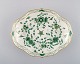 Meissen Green Indian bowl in hand-painted porcelain with green floral motifs. 
20th century.
