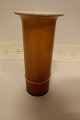 Vase from Holmegaard / Kastrup Glasværk, Denmark
From the Regnbue Serien (Rainbow Serie)
The beautiful caramel-colour outside with opal 
white hvidt glass inside
Design: Michael Bang i 1970
H: 17cm
In a good condition