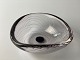 Art glass bowl by Vicke Lindstrand for the Swedish 
glassworks Kosta, 20th century, clear glass with 
purple threads