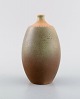 European studio ceramicist. Unique vase in glazed ceramics. 1970s.
