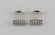 Axel Holm, Danish silversmith. A pair of art deco cufflinks in sterling silver. 
Mid-20th century.
