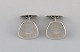 Danish silversmith. A pair of modernist cufflinks in sterling silver. 1960s / 
70s.

