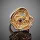 John Rørvig; Danish design ring made of 18k gold set with a ruby and a diamond