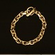 An 14kt gold anchor bracelet. L: 22cm. W: 84,3gr