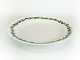 Large porcelain dish decorated with green leaves by Royal Copenhagen.
5000m2 showroom.