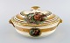 Royal Copenhagen lidded tureen in porcelain with romantic scenes and gold 
decoration. 20th century.
