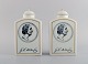 A pair of Bing & Grondahl H.C. Andersen tea caddies in porcelain with motifs 
from Copenhagen and Odense.
