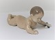 Royal Copenhagen. Porcelænsfigur. Liggende baby. Model 1739. Længde 15 cm. ( 1 
sortering )