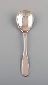 Evald Nielsen number 14 serving spoon in hammered silver (830). Dated 1928.
