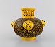 L'Art presents: Antique Zsolnay vase in openwork glazed ceramics. Beautiful glaze in yellow and brown shades. ...