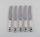 Five Georg Jensen Acorn fruit knives in sterling silver and stainless steel.
