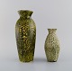 European studio ceramicist. Two vases in glazed ceramics. Beautiful glaze in 
green and yellow shades. 1960s / 70s.
