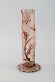 Early Emile Gallé vase in clear frosted art glass. Carved with motifs in the 
form of flowers and leaves. Angular bottom and top. Enamel work and gilt. Museum 
quality. Ca. 1885.
