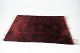 Carpet in red colours, in great vintage condition from the 1960s. 
5000m2 showroom.