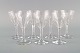 Baccarat, France. Seven white wine glasses in clear mouth-blown crystal glass. 
Mid-20th century.
