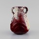 Karl Hansen Reistrup for Kähler. Antik vase med hanke i glaseret keramik. Smuk 
lustre glasur. 1890