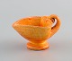 Kähler, Denmark. Cream jug in glazed stoneware. Beautiful orange uranium glaze. 
1940s.
