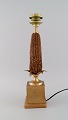 Maison Charles, France. Table lamp designed as a corn cob with base and brass 
leaves. 1960s / 70s.
