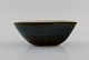 Gunnar Nylund (1904-1997) for Rörstrand. Bowl in glazed ceramics. Beautiful 
glaze in blue-green and brown shades. Mid-20th century.
