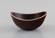 Gunnar Nylund (1904-1997) for Rörstrand. Bowl in glazed ceramics. Beautiful 
glaze in brown shades. Mid-20th century.
