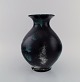 Jens Thirslund for Kähler, HAK. Vase in glazed stoneware. Beautiful glaze in 
shades of black, white and turquoise. 1920s / 30s.
