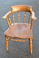 English captain chair with armrests, 19th century.