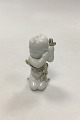 Bing & Grondahl Blanc de Chine Figurine of Child with seaweed. With gold 
decoration No 2267
