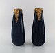 Pierre Perret for Vallauris. A pair of antique vases in glazed ceramics. 
Beautiful glaze in deep blue shades and hand-painted gold decoration. Early 20th 
century.
