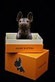 Original Louis Vuitton accessories, bag pendant in the shape of a small dog with 
Monogram Reverse Canvas. ...