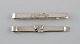 Two tie pins in silver (830) with flowers and foliage. Denmark, 1940s.
