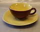 Teacup 5.3 x 10.5 cm & saucer 16 cm yellow and bordaux Congo Retro from 
Kronjyden Randers
