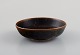 Saxbo miniature bowl in glazed ceramics. Beautiful glaze in brown shades. 
Mid-20th century.
