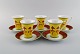 Paul Wunderlich for Rosenthal. Fem Bokhara kaffekopper med underkopper i 
porcelæn. Farverigt design, sent 1900-tallet.

