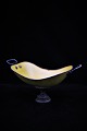 K&Co. presents: Swedish 1800 century bread basket in metal with yellow color, bronze handles and foot and a ...