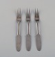 Gundorph Albertus for Georg Jensen. Three Mitra cold meat forks in stainless 
steel. 1970s.
