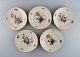 Five Royal Copenhagen Frijsenborg lunch plates in hand-painted porcelain with 
flowers and gold edge. 1950s.
