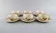 Six Royal Copenhagen Frijsenborg teacups with saucers in hand-painted porcelain 
with flowers and gold edge. 1950s.
