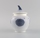 Royal Copenhagen Easter lidded jar in hand-painted porcelain. lid knob modeled 
as a bird. Dated 1919.
